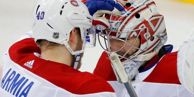 Montreal Canadiens right wing Joel Armia (40) celebrates with goaltender Carey Price (31) after the Canadiens beat the New York Rangers 4-2 in an NHL hockey game, Friday, March 1, 2019, in New York. (AP Photo/Julie Jacobson)