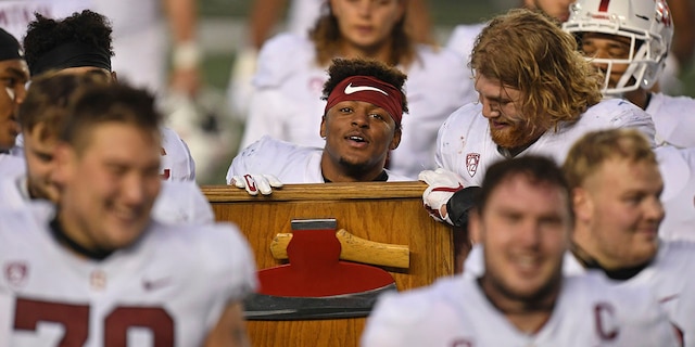 Stanford's Malik Antoine carries the Stanford Axe after Stanford defeated California 24-23 in an NCAA college football game Friday, Nov. 27, 2020, in Berkeley, Calif. (Jose Carlos Fajardo/Bay Area News Group via AP)