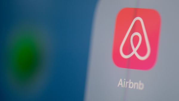 Airbnb is listing shares of its initial public offering Thursday, capping a tumultuous year for the short-term rental company.
