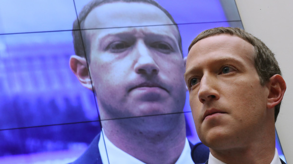 Facebook CEO Mark Zuckerberg testifies before the House Financial Services Committee in 2019. His company has been hit with twin lawsuits alleging it abused its power in order to crush rivals.