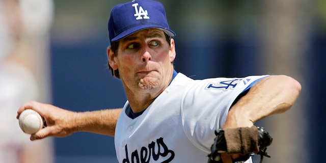 Los Angeles Dodgers p​​itcher Scott Erickson throws to a Los Angeles Angels batter in a baseball game in Los Angeles, April 3, 2005. (Associated Press)