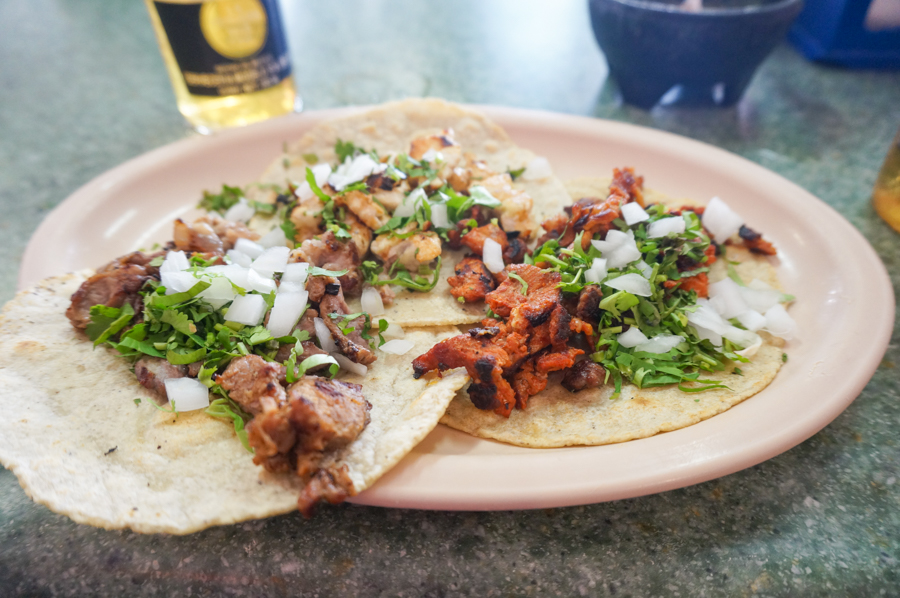puerto vallarta is one of the best places to visit in mexico. don't miss the tacos and beer!