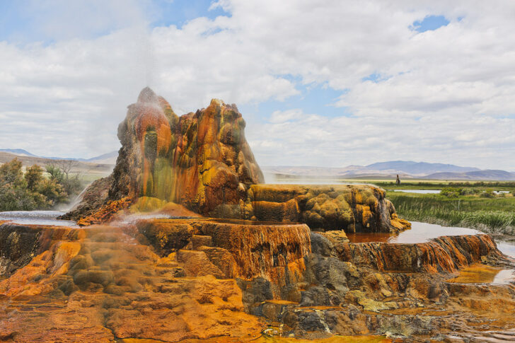 Want to visit the Fly Geyser in Gerlach Nevada? Save this pin and click through to find out how to book a rare tour of this beautiful phenomenon. Up until recently, no one was allowed to visit the fly ranch geyser property, but now that Burning Man owns it, you can go on nature walk tours to learn more the beautiful black rock desert, fly geyser tour, art installations, and the hot springs. // Local Adventurer #travelnevada #dfmi #nevada #flygeyser #blackrockdesert #desert