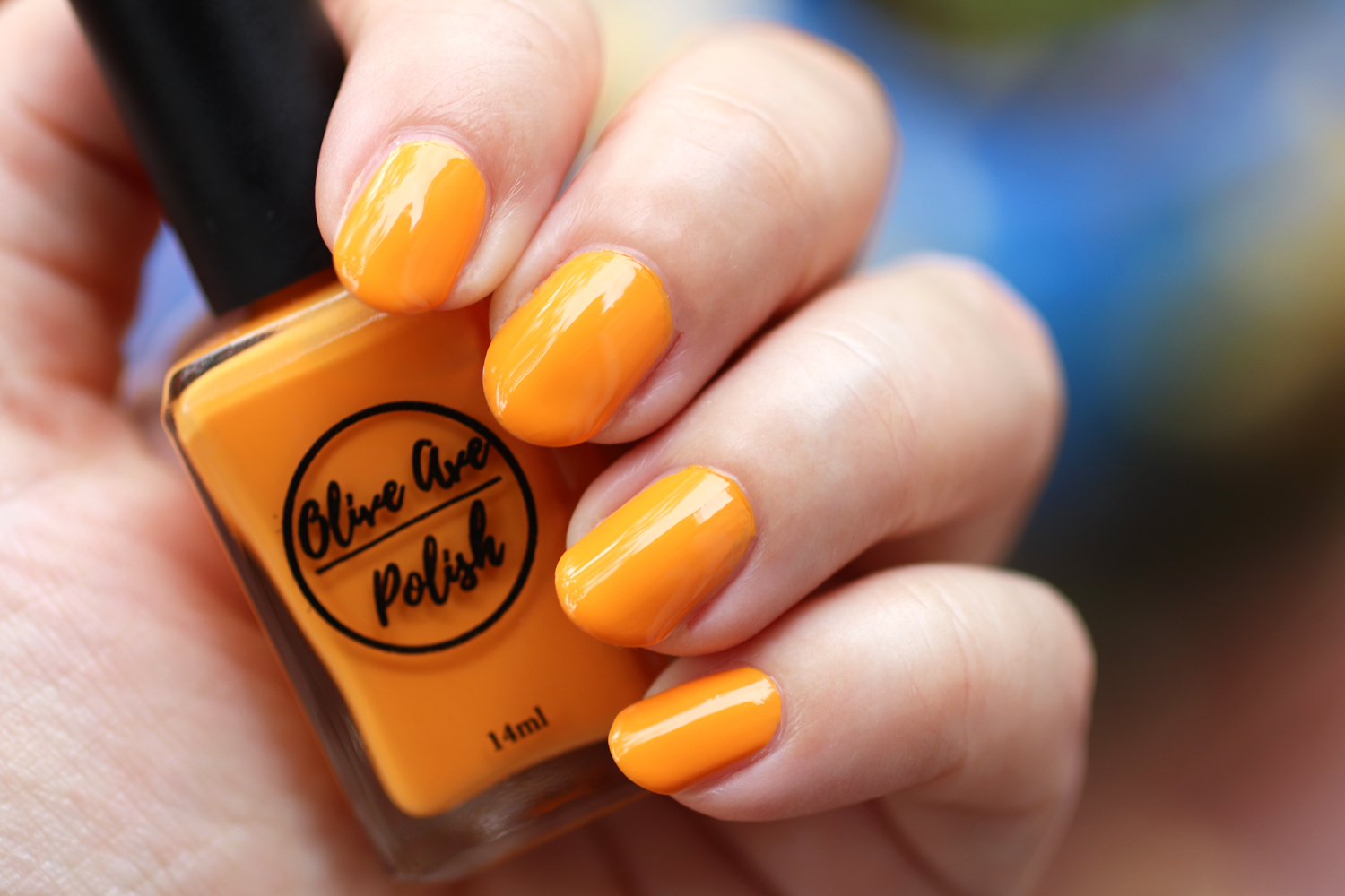 Tang bright orange nail polish by Olive Ave