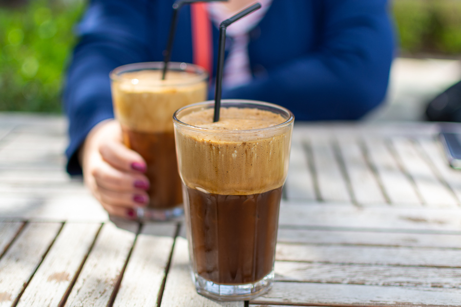 drinking freddo coffee in athens greece