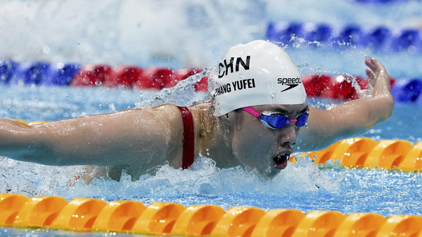 Zhang Yufei of China swims toward an Olympic record and gold medal in the women