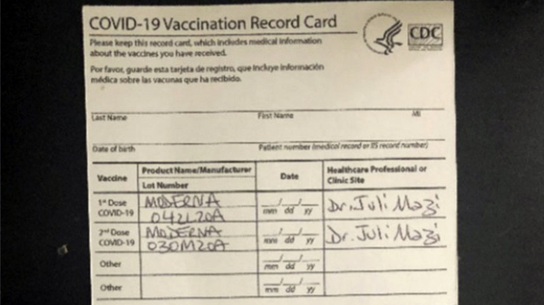 This undated image provided by the United States District Court for the Northern District of California shows two fake CDC COVID-19 vaccination record cards that are part of a criminal complaint.