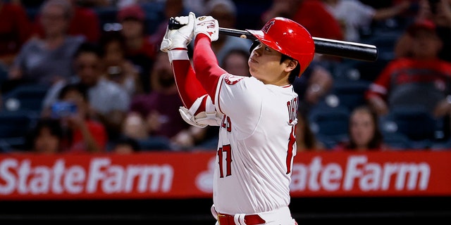 Los Angeles Angels slugger Shohei Ohtani hits during a game against the Texas Rangers in Anaheim, California, Sept. 4, 2021. (Associated Press)