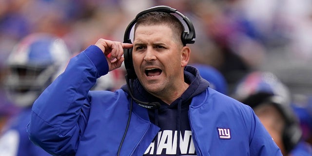 New York Giants head coach Joe Judge calls out to his players during the first half of an NFL football game against the Carolina Panthers, Sunday, Oct. 24, 2021, in East Rutherford, New Jersey.
