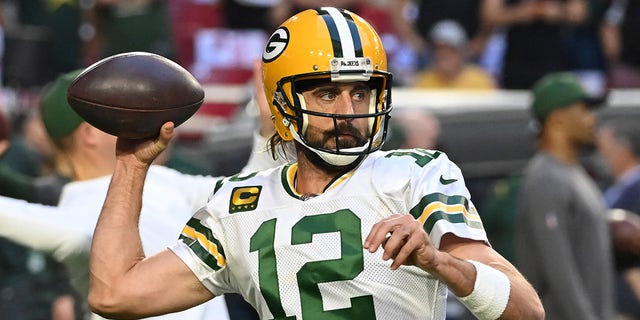 Aaron Rodgers of the Green Bay Packers prepares for a game against the Arizona Cardinals at State Farm Stadium Oct. 28, 2021 in Glendale, Ariz. Green Bay won 24-21.