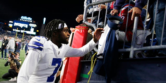 Dallas Cowboys cornerback Trevon Diggs (7) is congratulated by fans after an overtime win against the New England Patriots Sunday, Oct. 17, 2021, in Foxborough, Mass.