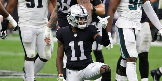 LAS VEGAS, NEVADA - OCTOBER 24:  Wide receiver Henry Ruggs III #11 of the Las Vegas Raiders spins the ball on the ground and gestures as he celebrates a catch for a first down against the Philadelphia Eagles during their game at Allegiant Stadium on October 24, 2021 in Las Vegas, Nevada. The Raiders defeated the Eagles 33-22.  (Photo by Ethan Miller/Getty Images)