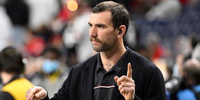 Andrew Luck on the field before the 2022 college football national championship game between the Alabama Crimson Tide and the Georgia Bulldogs at Lucas Oil Stadium Jan. 10, 2022, in Indianapolis.