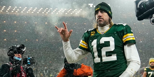 Quarterback Aaron Rodgers of the Green Bay Packers gestures as he exits the field after losing the NFC Divisional Playoff game to the San Francisco 49ers at Lambeau Field on Jan. 22, 2022, in Green Bay, Wisconsin. 