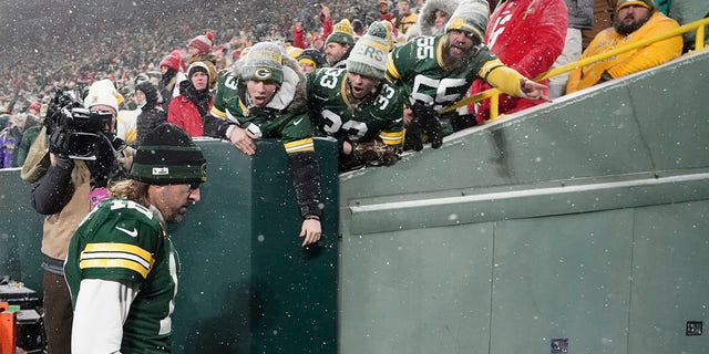 Green Bay Packers' Aaron Rodgers leaves the field after an NFC divisional playoff NFL football game against the San Francisco 49ers Saturday, Jan. 22, 2022, in Green Bay, Wisconsin. The 49ers won 13-10 to advance to the NFC Championship game.