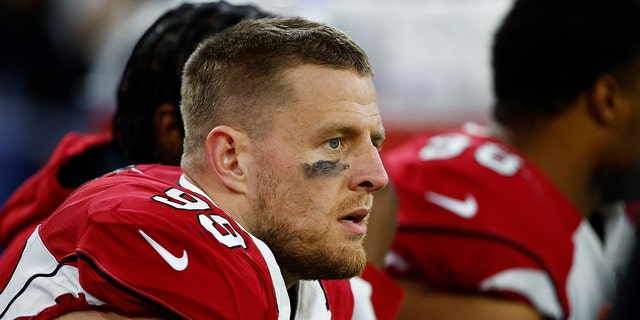 J.J. Watt of the Arizona Cardinals looks on from the sidelines against the Los Angeles Rams during the third quarter in the NFC Wild Card Playoff game at SoFi Stadium on Jan. 17, 2022, in Inglewood, California.