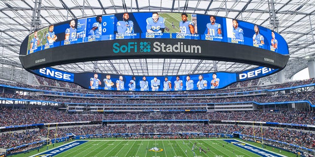 This is a general overall interior view of SoFi Stadium as the Los Angeles Rams take on the Tampa Bay Buccaneers Sept. 26, 2021, in Inglewood, Calif. A late-season surge in COVID-19 cases had the NFL in 2021 looking a lot like 2020, when the coronavirus led to significant disruptions, postponements and changing protocols. The emerging omicron variant figures to play a role all the way through the playoffs, including the Super Bowl in Los Angeles, where California has always been aggressive with policies to combat the spread of the virus.