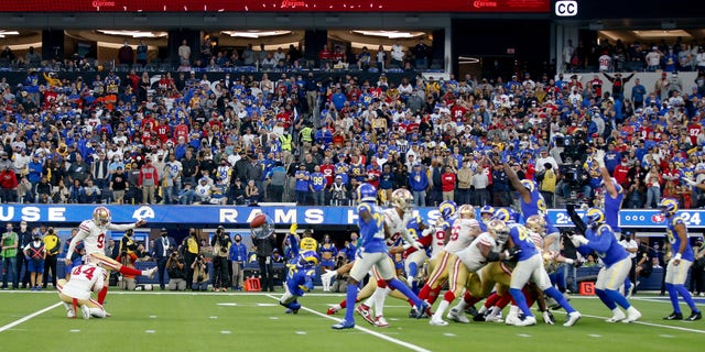 Robbie Gould of the San Francisco 49ers kicks a 24-yard field goal, in overtime, against the Los Angeles Rams at SoFi Stadium on Jan. 9, 2022, in Inglewood, California. The 49ers defeated the Rams 27-24. 