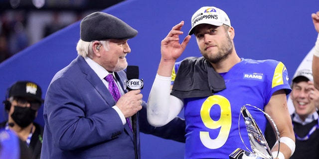 Los Angeles Rams quarterback Matthew Stafford (9) talks with Terry Bradshaw after defeating the San Francisco 49ers in the NFC Championships at SoFi Stadium on Sunday, Jan. 30, 2022, in Los Angeles, California.