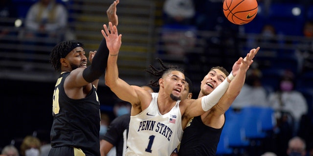 Purdue's Trevion Williams (50), Penn State's Seth Lundy (1) and Purdue's Mason Gillis (0) go for a loose ball during an NCAA college basketball game Saturday, Jan. 8, 2022, in State College, Pa. 