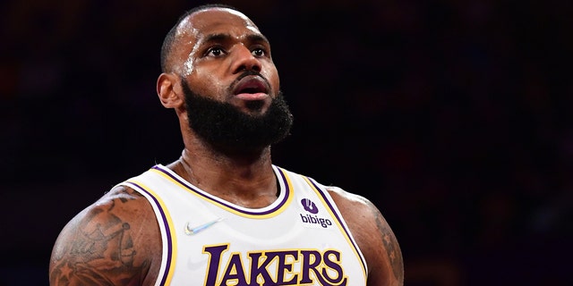 LeBron James #6 of the Los Angeles Lakers shoots a free throw during the game against the Detroit Pistons on November 28, 2021 at STAPLES Center in Los Angeles, California.