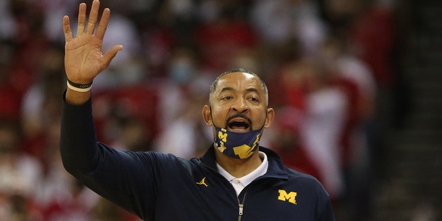 Madison, Wisconsin, USA; Michigan Wolverines head coach Juwan Howard  directs his team during the game with the Wisconsin Badgers at the Kohl Center.