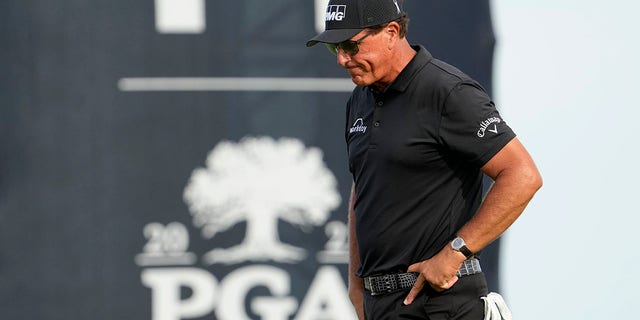 FILE - Phil Mickelson walks off the 14th green after missing a birdie putt during the third round at the PGA Championship golf tournament on the Ocean Course, Saturday, May 22, 2021, in Kiawah Island, S.C. Whether his true intentions were chasing Saudi Arabian money or gaining more control over how he thinks the PGA Tour should be run, Mickelson has been exposed for manipulating people to get what he wants.