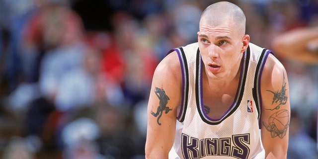 Jason Williams of the Sacramento Kings waits on the court during the game against the San Antonio Spurs at the ARCO Arena in Sacramento, California.  The Spurs defeated the Kings 97-91.