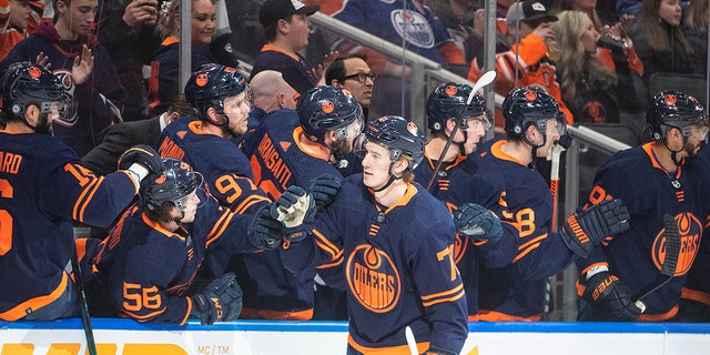 Edmonton Oilers' Ryan McLeod (71) celebrates a goal against the Arizona Coyotes during first-period NHL hockey game action in Edmonton, Alberta, Monday, March 28, 2022.