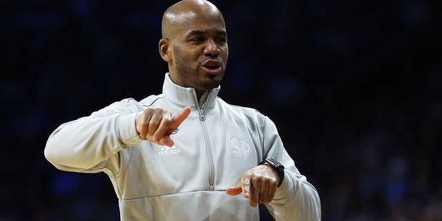 Head coach Shaheen Holloway of the St. Peter's Peacocks reacts on the sidelines in the first half of the game against the Purdue Boilermakers in the Sweet Sixteen round game of the 2022 NCAA Men's Basketball Tournament at Wells Fargo Center on March 25, 2022 in Philadelphia, Pennsylvania.