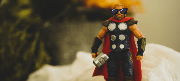 Thor action figure with illustrated black sunglasses