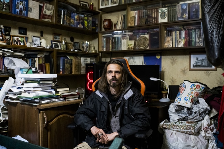 Anton Bondarev, an Archivist, History Researcher, and Founder of "Kharkiv History Night", in his home office on May 18, 2022, in Kharkiv, Ukraine.