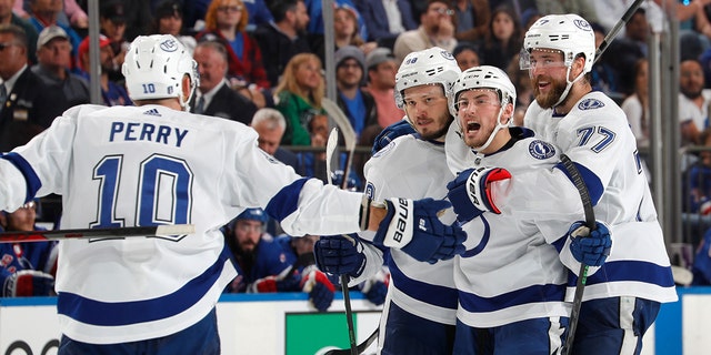 Mikhail Sergachev #98 of the Tampa Bay Lightning celebrates with teammates after scoring a goal in the second period against the New York Rangers in Game Five of the Eastern Conference Final of the 2022 Stanley Cup Playoffs at Madison Square Garden on June 9, 2022 in New York City.