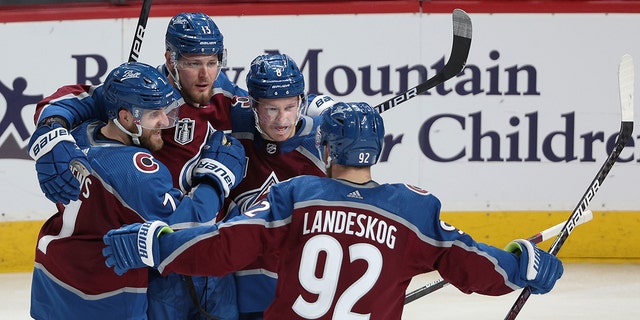 Cale Makar #8 of the Colorado Avalanche celebrates scoring a goal with teammates during the third period in Game Five of the 2022 NHL Stanley Cup Final at Ball Arena on June 24, 2022 in Denver, Colorado.