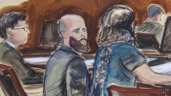 In this courtroom sketch, Joshua Schulte (center) is seated at the defense table flanked by his attorneys on March 4, 2020, in New York.
