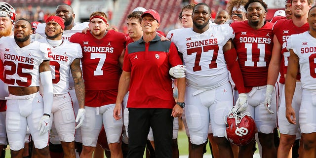 Head coach Brent Venables of the Oklahoma Sooners stands with his team for the alma mater during their spring game at Gaylord Family Oklahoma Memorial Stadium on April 23, 2022, in Norman, Oklahoma.  