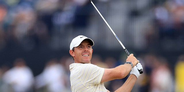 Rory McIlroy of Northern Ireland plays his second shot on the fourth hole during the final round of The 150th Open on The Old Course at St. Andrews July 17, 2022, in St. Andrews, Scotland.