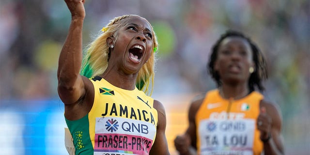 Shelly-Ann Fraser-Pryce, of Jamaica, reacts after winning Gold in the final in the women's 100-meter run at the World Athletics Championships on Sunday, July 17, 2022, in Eugene, Ore. 