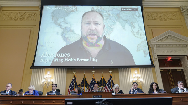 A video showing Alex Jones is shown as the House select committee investigating the Jan. 6, 2021, attack on the U.S. Capitol holds a hearing on July 12.