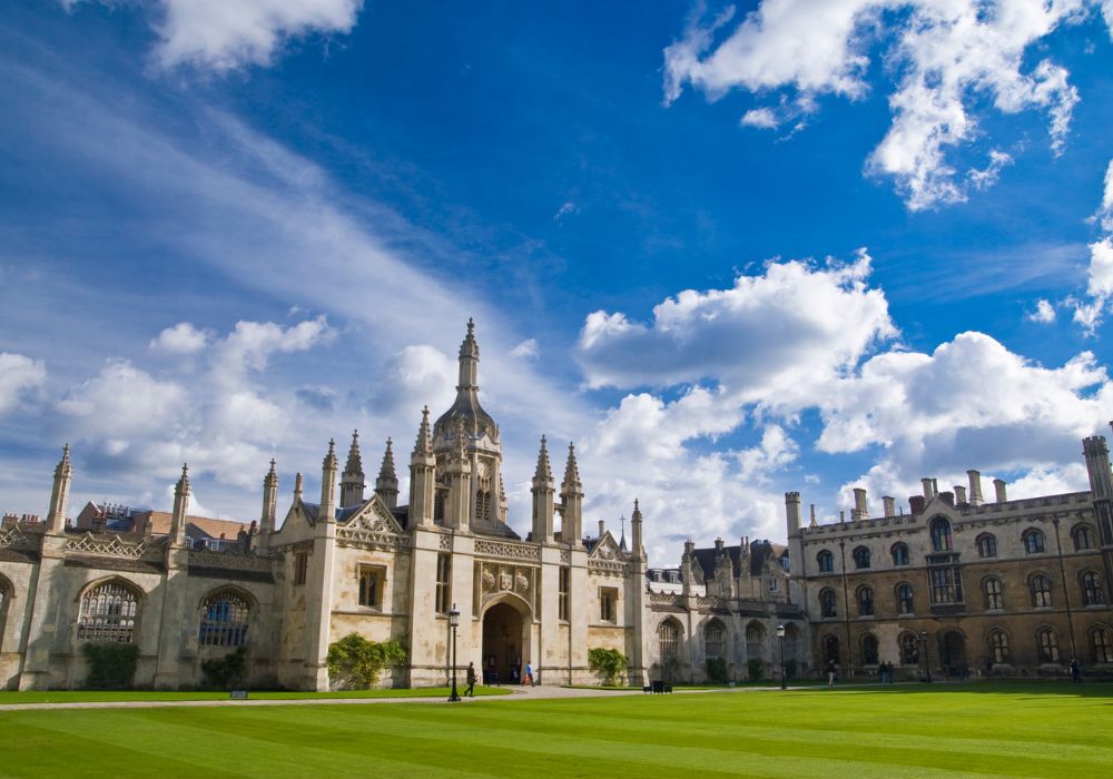 The King's College Cambridge UK during daylight on a cloudy blue sky.