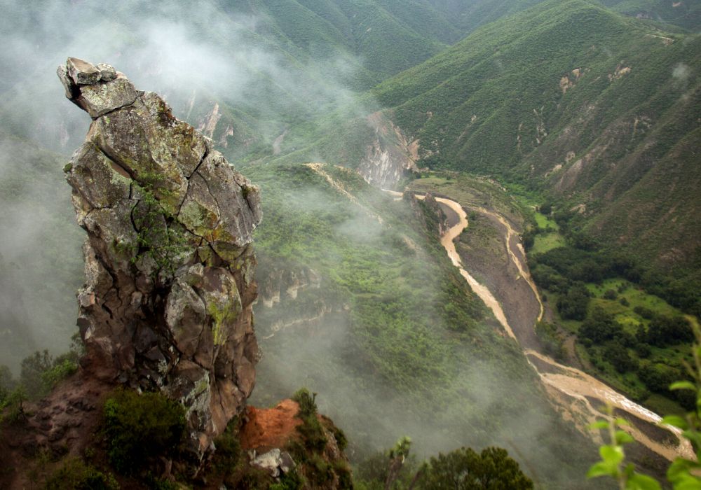 A mountainous rocky scenic view in a foggy Huasca de Ocampo, Mexico.