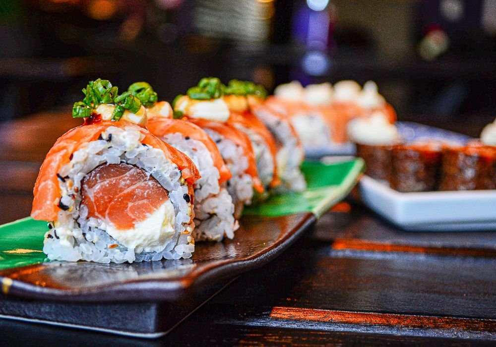 Sushi served on a ceramic plate.