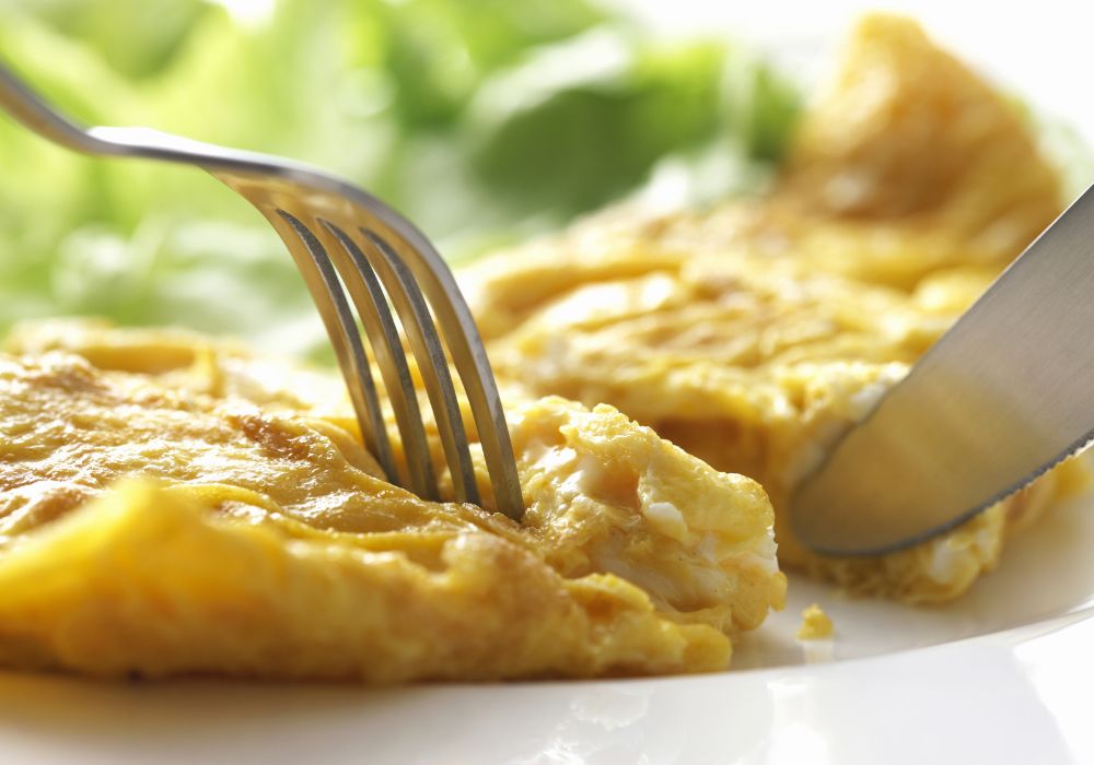 Omelette on white ceramic plate.