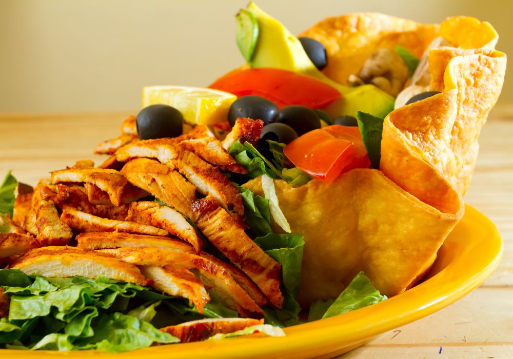 A salad at a Mexican restaurant ready to be served.