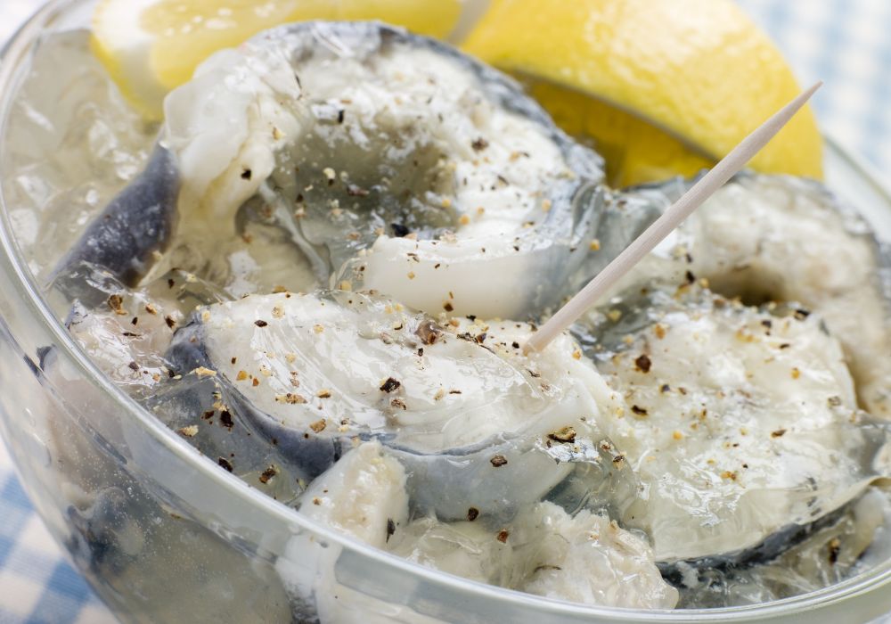 A must-try is the traditional British jellied eels served in a bowl.