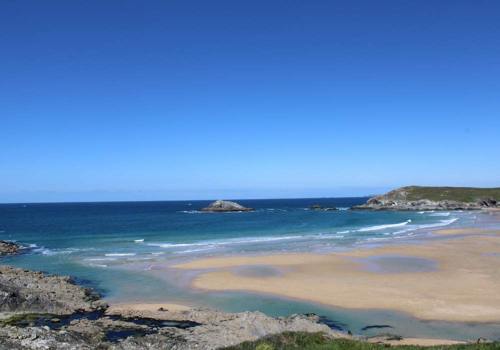Beautiful blue sky over the stunning Crantock beach in Newquay, Cornwall.