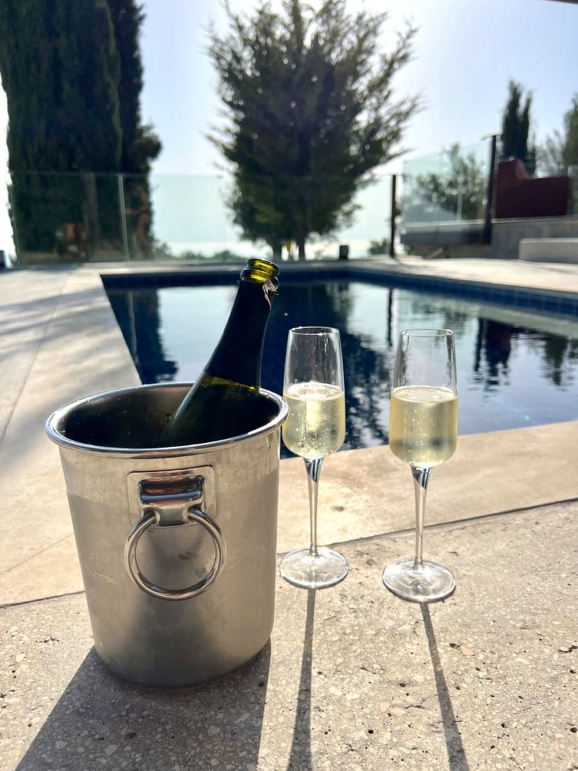 sparkling wine in bucket by the pool in cyprus