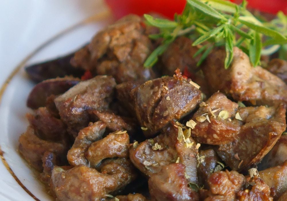 Albanian liver cooked with vegetables in plate