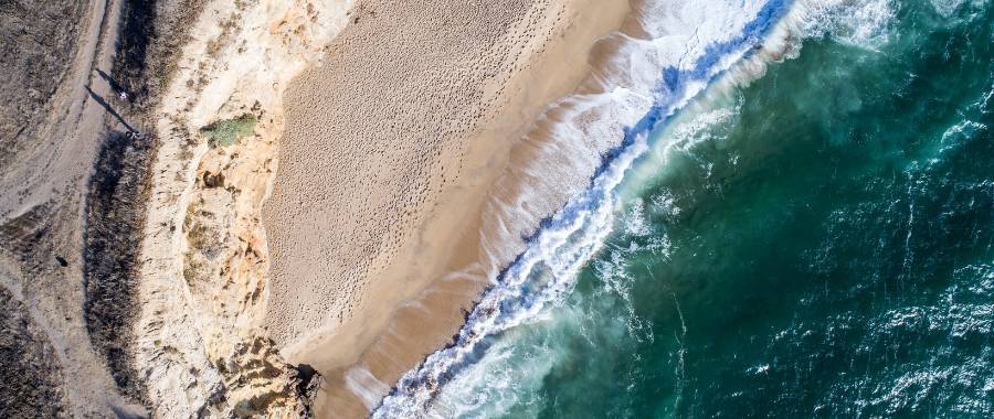 Aerial view of the crashing surf in Santa Cruz California