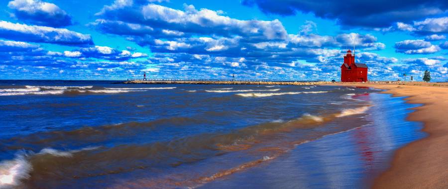 view of the beach and lighthouse at Holland, MI